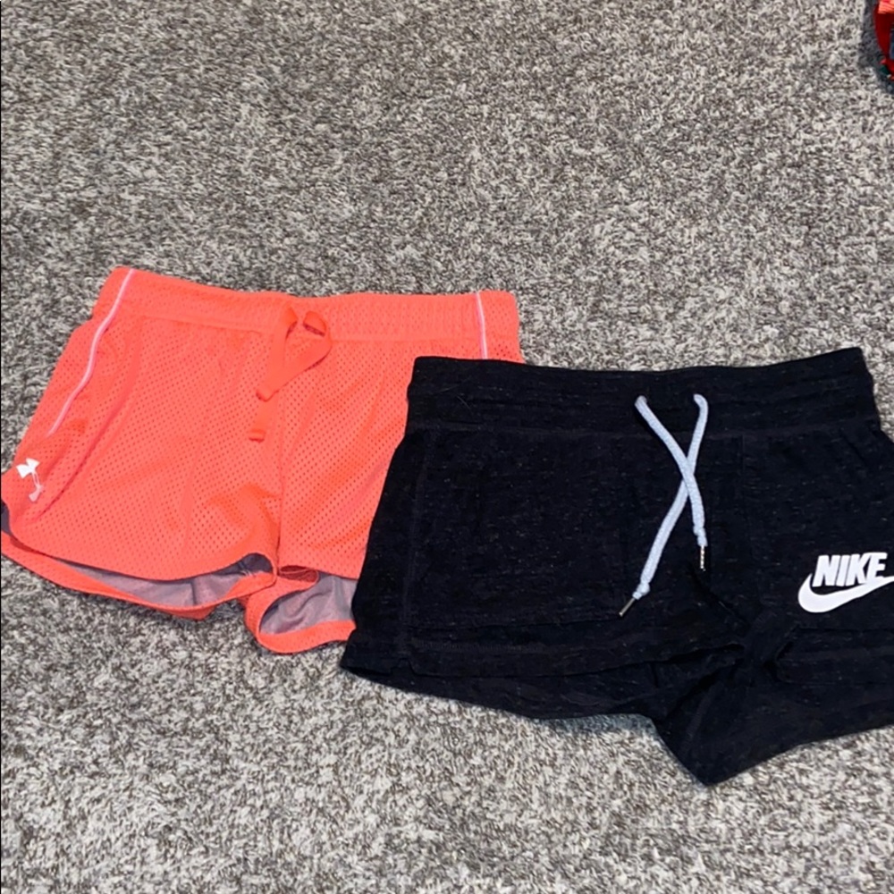 Orange Under Armour short and black Nike short